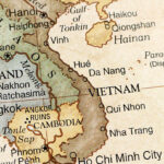 A close-up/macro photograph of Vietnam and from a desktop globe. Adobe RGB color profile.